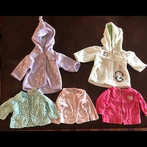 Five newborn size indoor and outdoor jackets